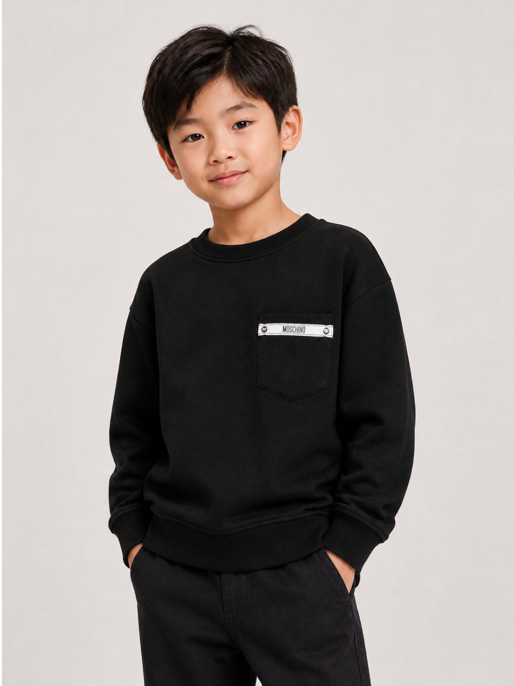Felpa per bambino Moschino Kids nera con logo sul davanti HMF09PLCA92 60100 MOSCHINO KIDS 