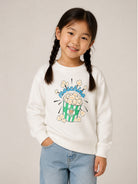 Felpa per bambini Moschino Kids bianca con stampa grafica HNF099LCA94 10063 MOSCHINO KIDS 