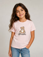 T-shirt per bambini Moschino Kids rosa con stampa logo sul davanti HNM05VLAA10 50209 MOSCHINO KIDS 