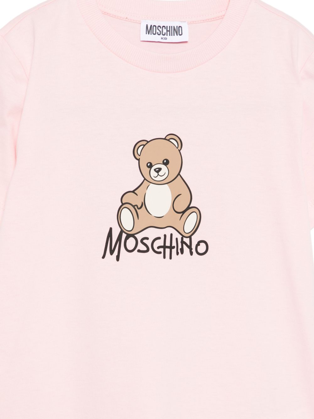 T-shirt per bambini Moschino Kids rosa con stampa logo sul davanti HNM05VLAA10 50209 MOSCHINO KIDS 