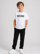 T-shirt per bambini Moschino Kids bianca con logo sul davanti HTM05WLAA10 10101 MOSCHINO KIDS 