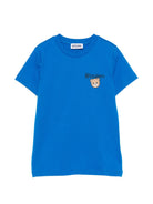 T-shirt per bambino Moschino Kids azzurra con stampa logo sul davanti HUM05VLAA34 40157 MOSCHINO KIDS 