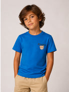 T-shirt per bambino Moschino Kids azzurra con stampa logo sul davanti HUM05VLAA34 40157 MOSCHINO KIDS 