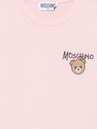 T-shirt per bambino Moschino Kids rosa con stampa logo sul davanti HUM05VLAA34 50209 MOSCHINO KIDS 
