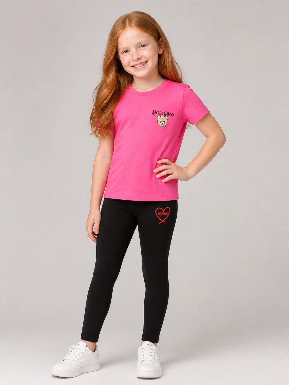 T-shirt per bambino Moschino Kids fucsia con stampa logo sul davanti HUM05VLAA34 51450 MOSCHINO KIDS 