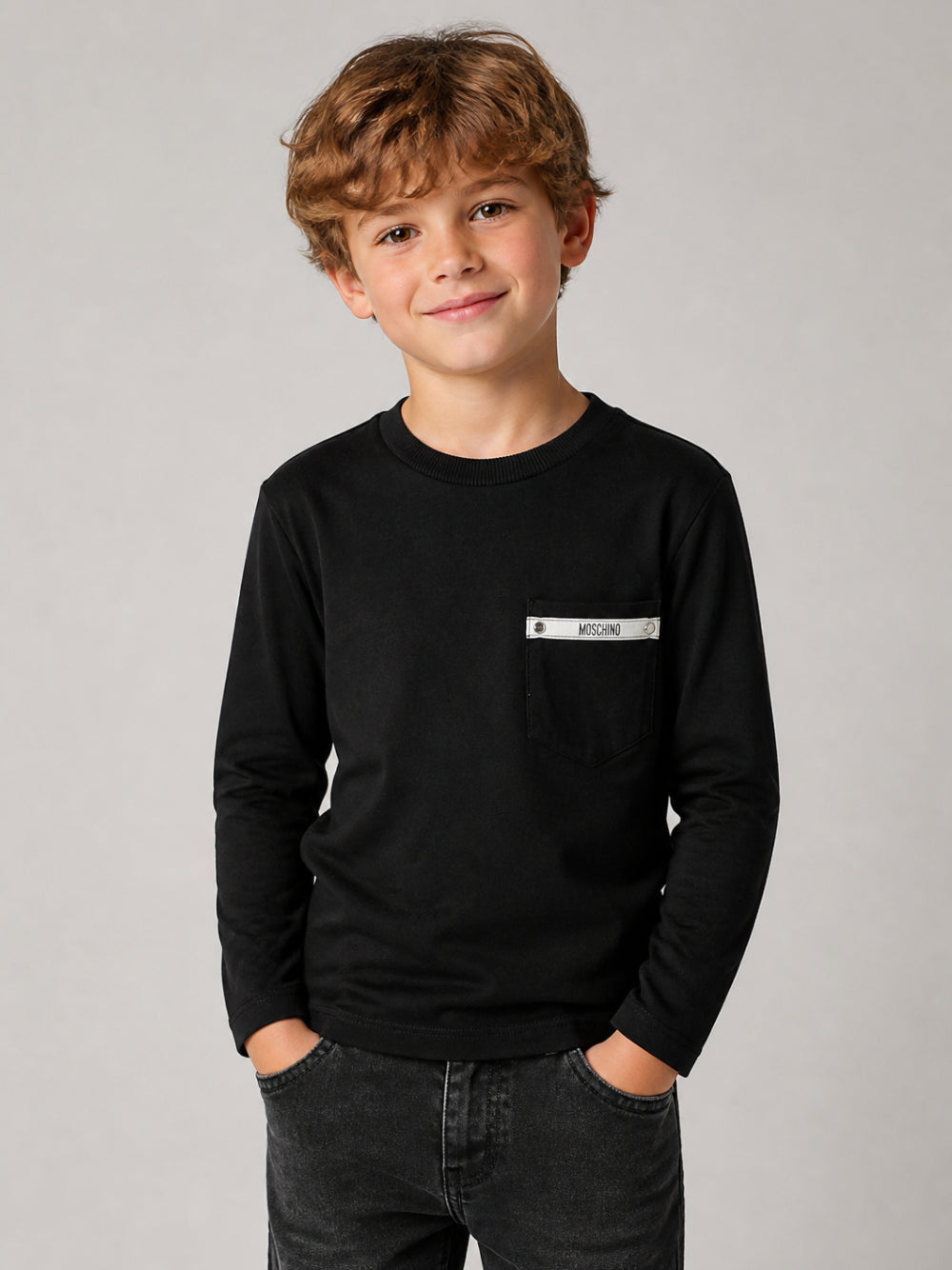 T-shirt per bambino Moschino Kids nera con logo sul petto HUO012LAA57 60100 MOSCHINO KIDS 