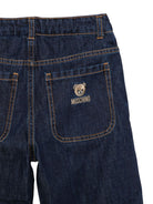 Jeans per bambino Moschino Kids blu ricamati con motivo orsacchiotto HUP095L0E49 41150 MOSCHINO KIDS 
