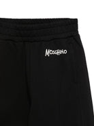 Pantatuta per bambino Moschino Kids nero con stampa logo sul davanti HUP09CLCA83 60100 MOSCHINO KIDS 