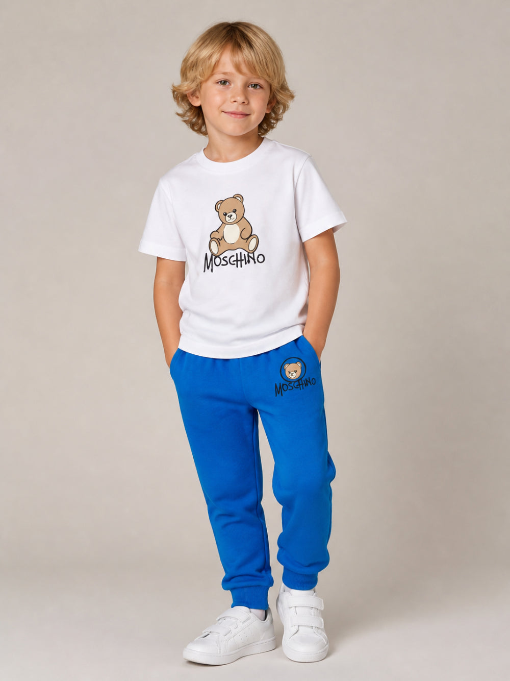 Pantatuta per bambino Moschino Kids blu con stampa logo sul davanti HUP09DLCA83 40157 MOSCHINO KIDS 