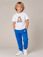 Pantatuta per bambino Moschino Kids blu con stampa logo sul davanti HUP09DLCA83 40157 MOSCHINO KIDS 
