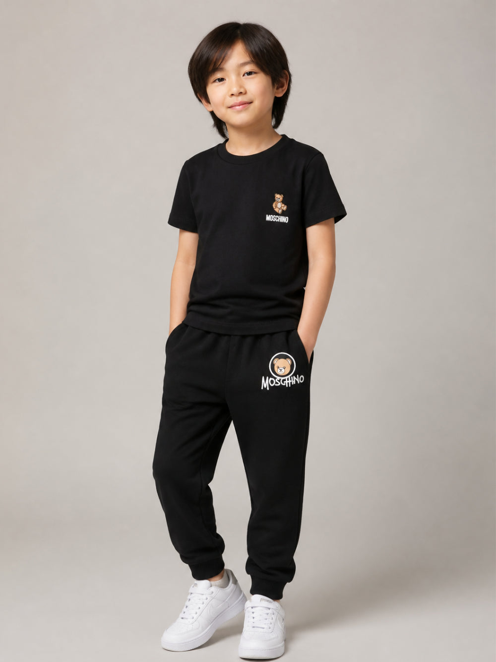Pantatuta per bambino Moschino Kids nero con patch orsetto applicata HUP09DLCA83 60100 MOSCHINO KIDS 