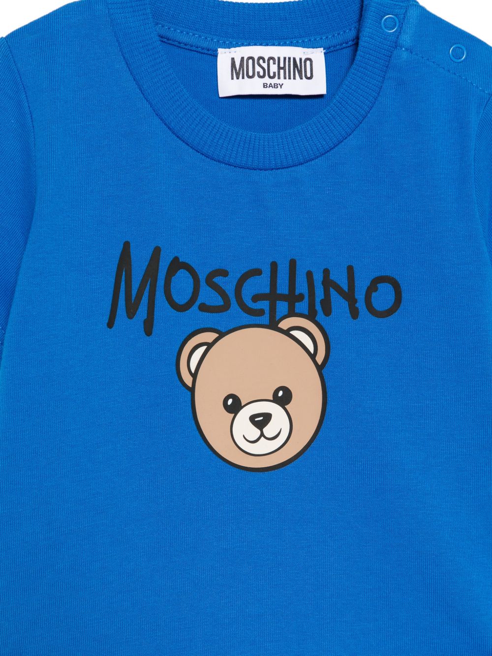 T-shirt per neonato Moschino Kids blu con stampa Teddy Bear sul davanti M6M047LAA34 40157 MOSCHINO KIDS 