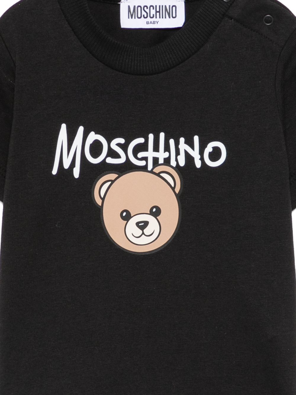 T-shirt per neonati Moschino Kids nera con stampa Teddy Bear sul davanti M6M047LAA34 60100 MOSCHINO KIDS 