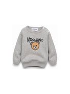 Maglione per neonato Moschino Kids grigio con logo ricamato sul davanti M9W00JLHE43 60901 MOSCHINO KIDS 
