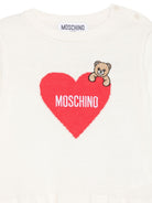Abito per bambina Moschino Kids bianco con motivo a cuore e orsacchiotto MAV0CTLHE66 10063 MOSCHINO KIDS 