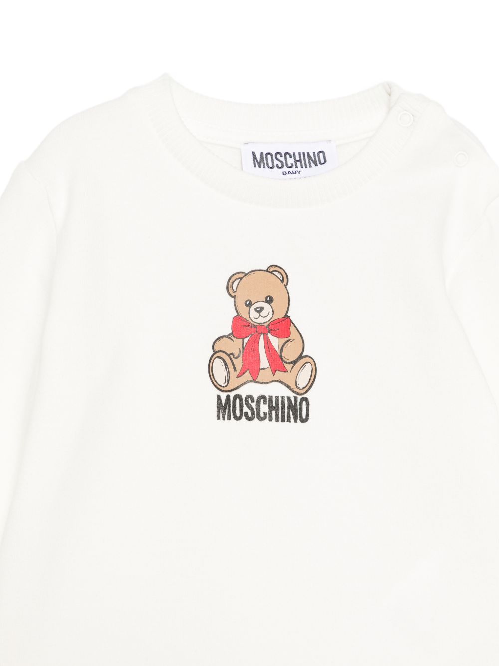 Abito per neonata Moschino Kids bianco con stampa orsetto sul davanti MBV0BKLDA18 10063 MOSCHINO KIDS 