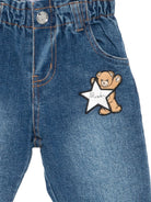 Jeans per neonato Moschino Kids blu con patch a stella MDP03MLXE64 40507 MOSCHINO KIDS 
