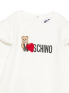 Abito per neonata Moschino Kids bianco con ruches MDV0DPLDA18 10063 MOSCHINO KIDS 