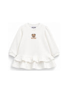 Abito per neonata Moschino Kids bianco con volant con motivo orsetto MDV0DQLCA40 10063 MOSCHINO KIDS 