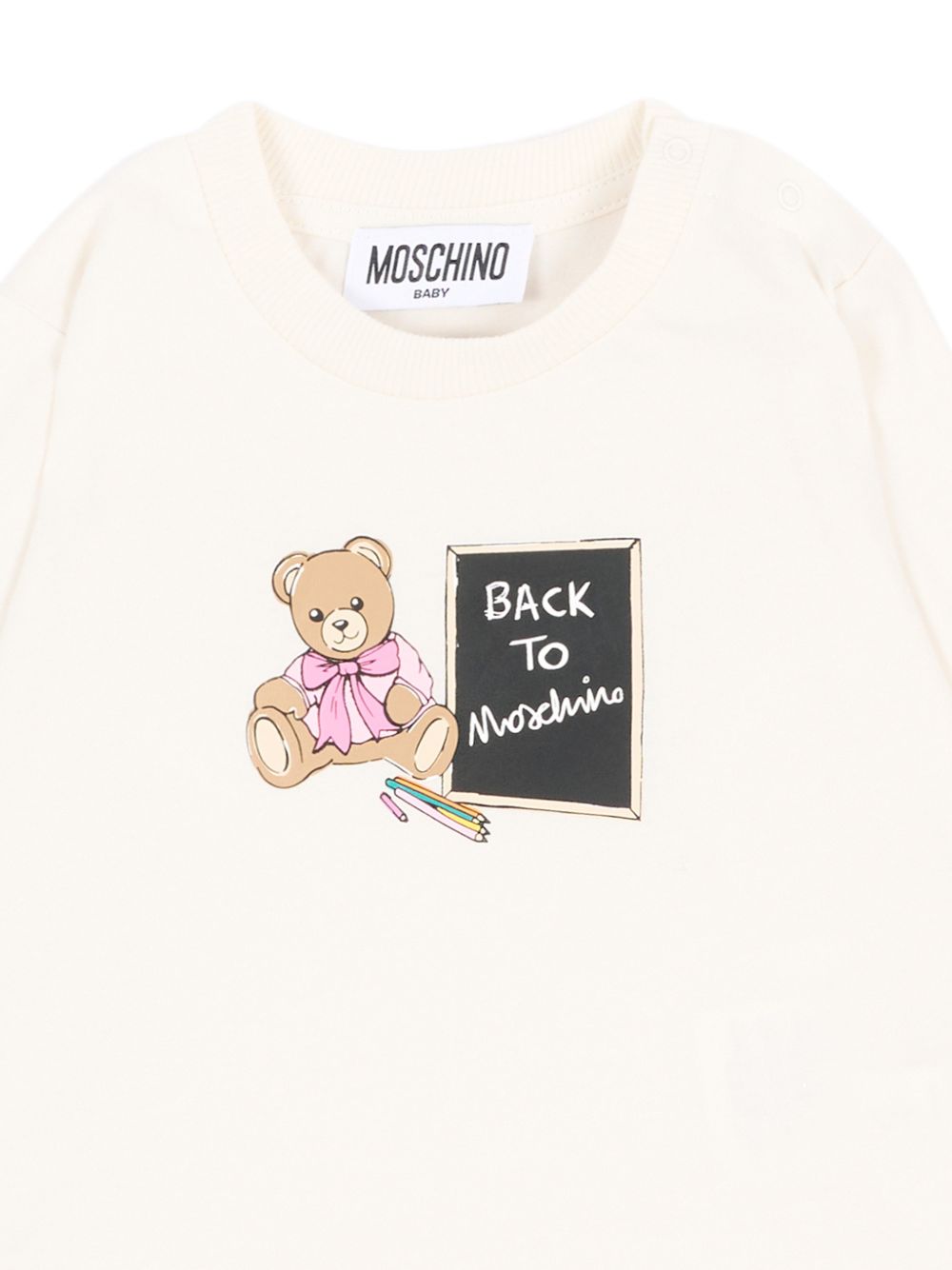 T-shirt per neonati Moschino Kids bianca avorio a maniche lunghe MQO014LAA10 10063 MOSCHINO KIDS 