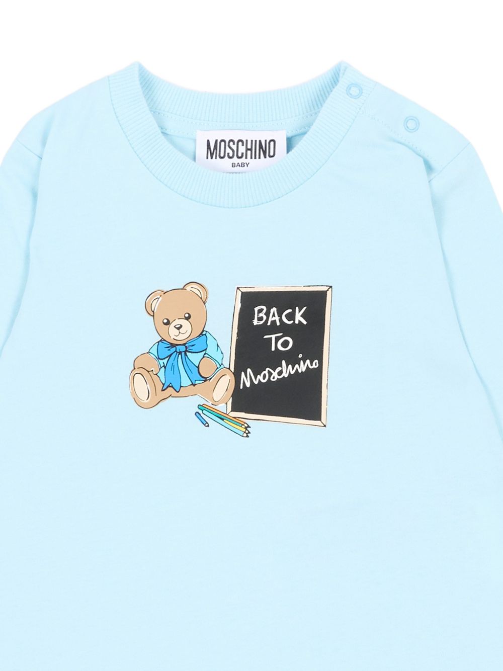 T-shirt neonato Moschino Kids azzurra a maniche lunghe MQO014LAA10 40304 MOSCHINO KIDS 