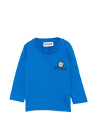 T-shirt per neonato Moschino Kids azzurra con stampa Teddy sul davanti MRO014LAA34 40157 MOSCHINO KIDS 