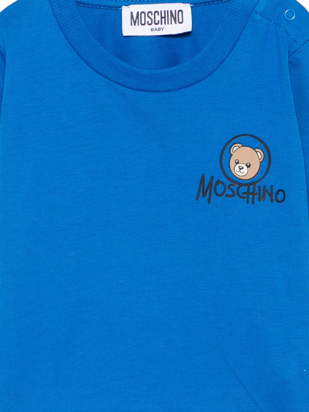 T-shirt per neonato Moschino Kids azzurra con stampa Teddy sul davanti MRO014LAA34 40157 MOSCHINO KIDS 