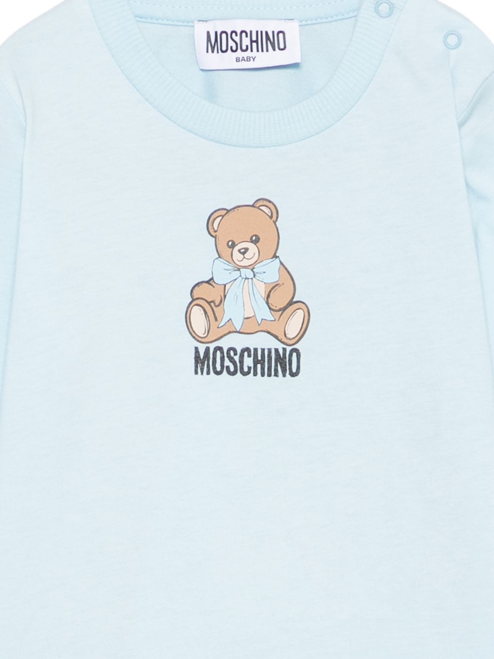 T-shirt per neonato Moschino Kids azzurra con stampa Teddy con dettaglio fiocco MTO014LAA10 40304 MOSCHINO KIDS 