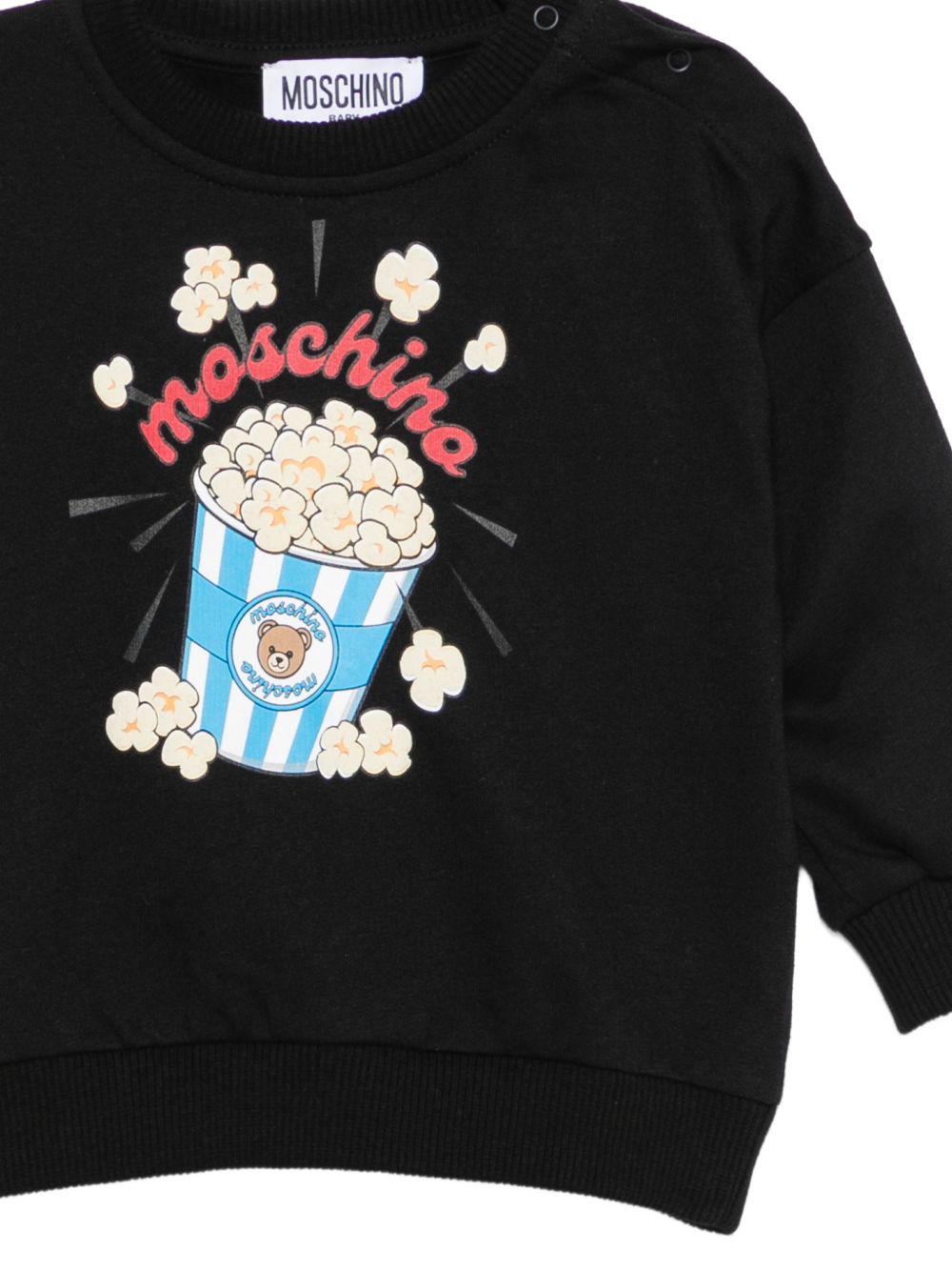 Felpa per neonati Moschino Kids nera con stampa grafica MUF06QLCA40 60100 MOSCHINO KIDS 