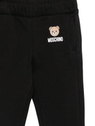 Pantaloni per neonati Moschino Kids neri con motivo Teddy Bear MUP05XLCA92 60100 MOSCHINO KIDS 