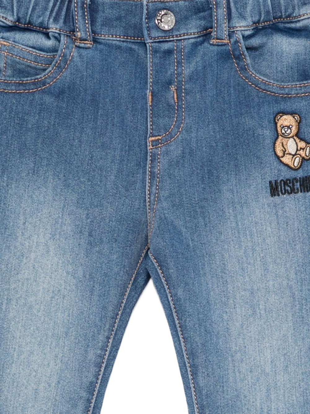Jeans per neonato Moschino Kids blu con effetto schiarito MUP065LXE43 40332 MOSCHINO KIDS 