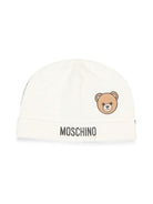 Berretto per neonati Moschino Kids bianco con dettaglio Teddy Bear MUX066LCA40 10063 MOSCHINO KIDS 