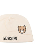 Berretto per neonati Moschino Kids beige con stampa grafica MUX066LCA40 20404 MOSCHINO KIDS 