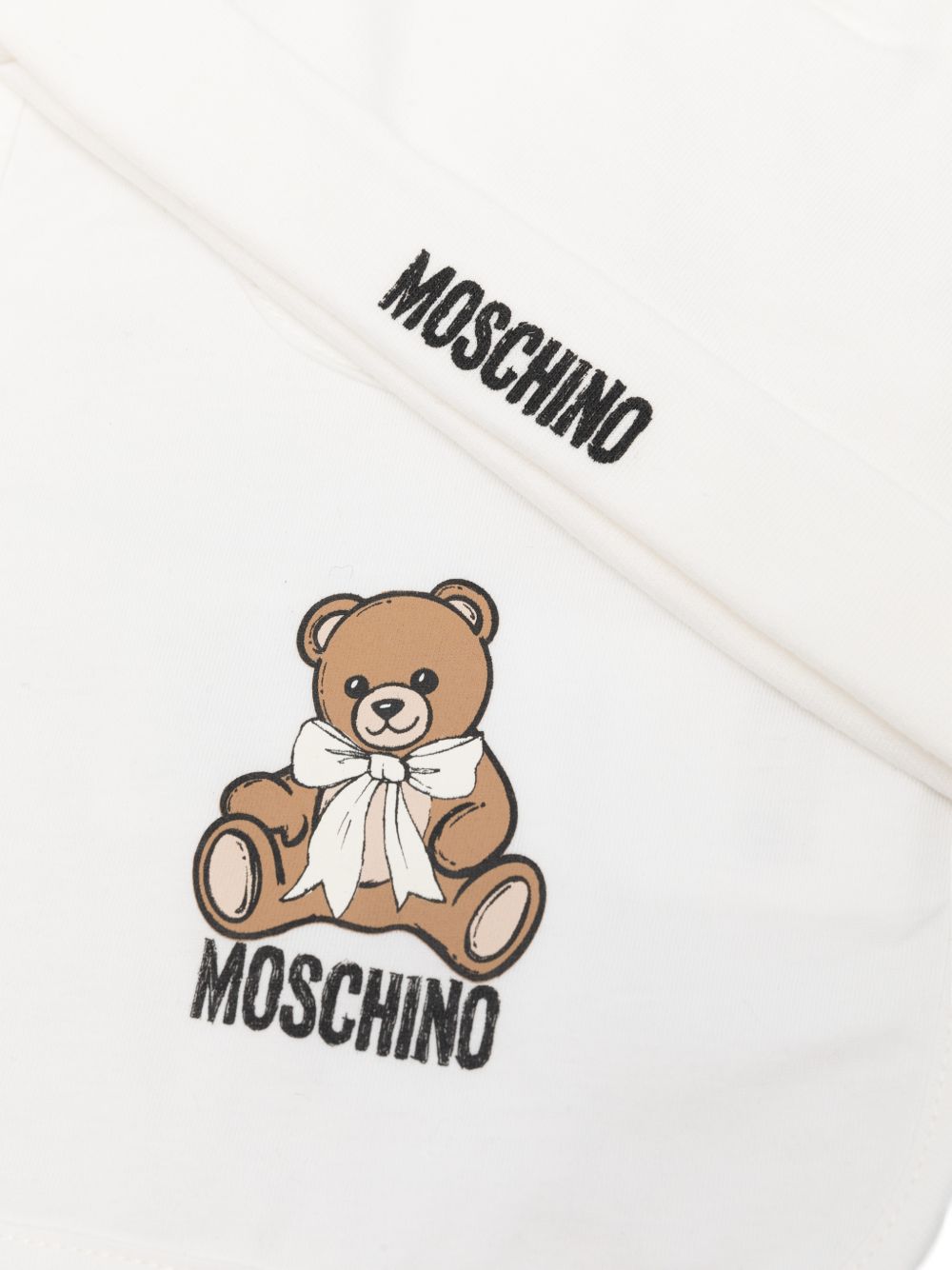 Set cappellino e bavetta per neonati Moschino Kids bianco con stampa Teddy Bear MUY09LLCA40 10063 MOSCHINO KIDS 