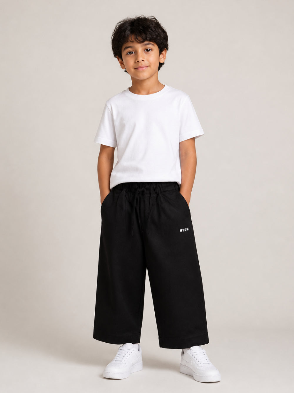Pantaloni per bambino MSGM Kids nero con logo ricamato F6MSJBPA302 110 MSGM KIDS 