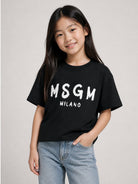 T-shirt per bambina MSGM Kids nera con stampa grafica logo F6MSJGTH046 110 MSGM KIDS 