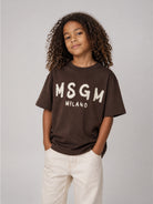 T-shirt per bambini MSGM Kids marrone con stampa grafica logo F6MSJUTH010 943 MSGM KIDS 