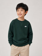 Felpa per bambini New Balance Kids verde con logo sul davanti LAKB0055 NOG NEW BALANCE KIDS 
