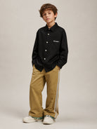 Camicia per bambino Palm Angels Kids nera con logo sul davanti F6PAJBSI169 110 PALM ANGELS KIDS 