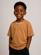 T-shirt per bambino Palm Angels Kids marrone con stampa logo sul girocollo F6PAJBTH012 1531 PALM ANGELS KIDS 