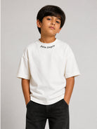T-shirt per bambino Palm Angels Kids bianca con logo sul davanti F6PAJBTH012 412 PALM ANGELS KIDS 