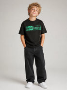 T-shirt per bambino Palm Angels Kids nera con stampa logo sul davanti F6PAJBTH113 110 PALM ANGELS KIDS 