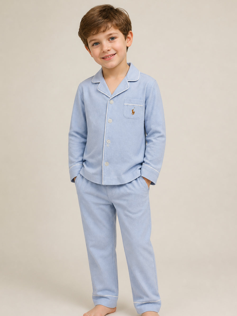 Pigiama per bambino Polo Ralph Lauren Kids azzurro con dettaglio ricamato P0193 BGI Ralph Lauren kids 
