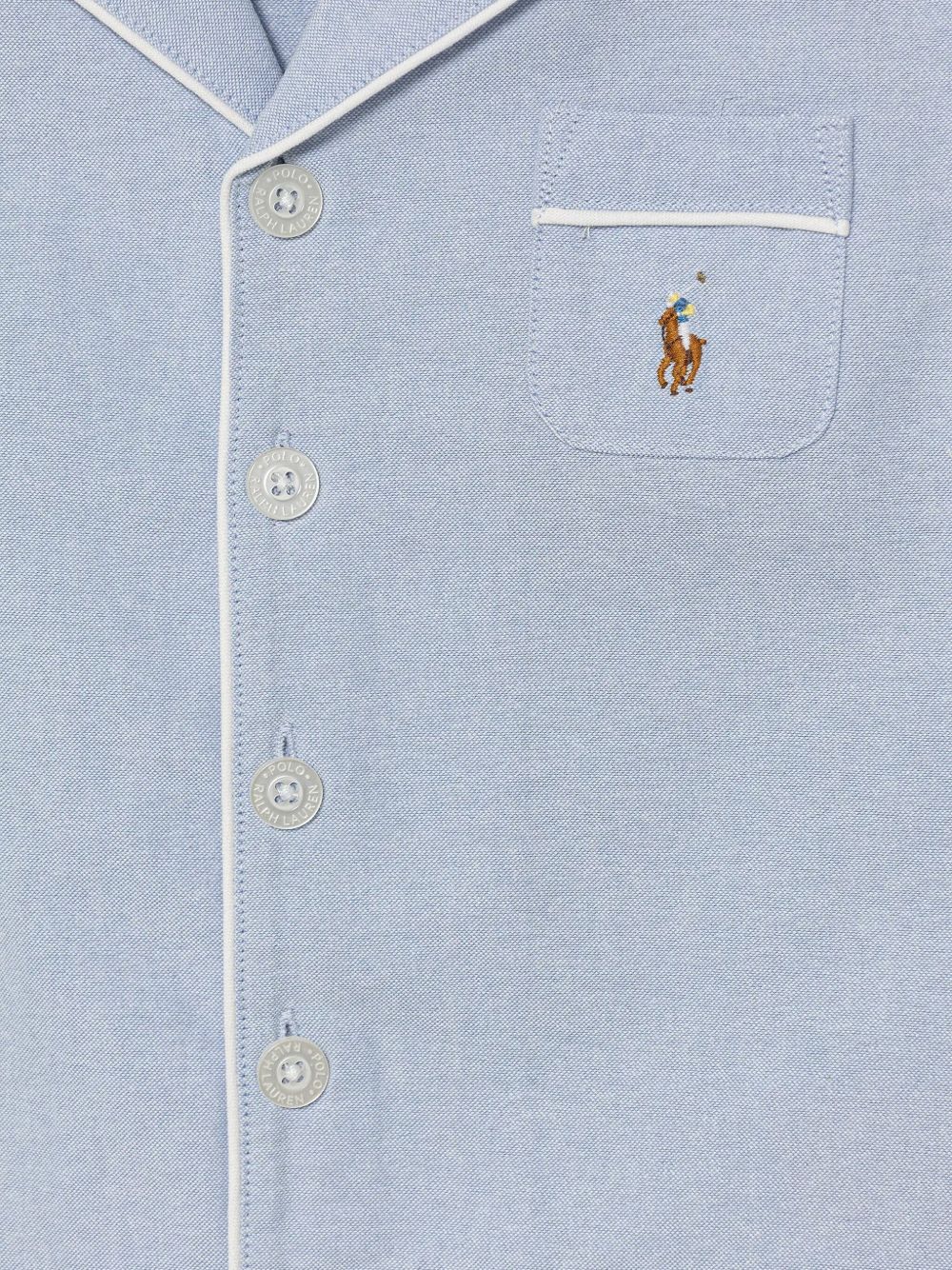 Pigiama per bambino Polo Ralph Lauren Kids azzurro con dettaglio ricamato P0193 BGI Ralph Lauren kids 