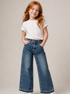Jeans per bambina Stella McCartney Kids in denim a gamba ampia con frange TZ6C80 Z0746 665 STELLA McCARTNEY KIDS 