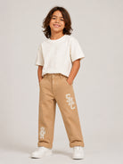 Pantaloni per bambino Stella McCartney Kids beige con stampa logo TZ6I40 Z2661 132 STELLA McCARTNEY KIDS 