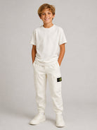 Pantaloni cargo per bambino Stone Island Kids bianchi in velluto a coste L2S163100005S0199 V0097 STONE ISLAND KIDS 
