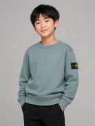 Felpa per bambino Stone Island Kids azzurra con distintivo Compass L2S166100001S0A20 V004B STONE ISLAND KIDS 