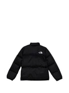 Giubbino Nuptse per bambini The North Face Kids nero con logo stampato sul davanti NF0A82TS GOF1 THE NORTH FACE KIDS 