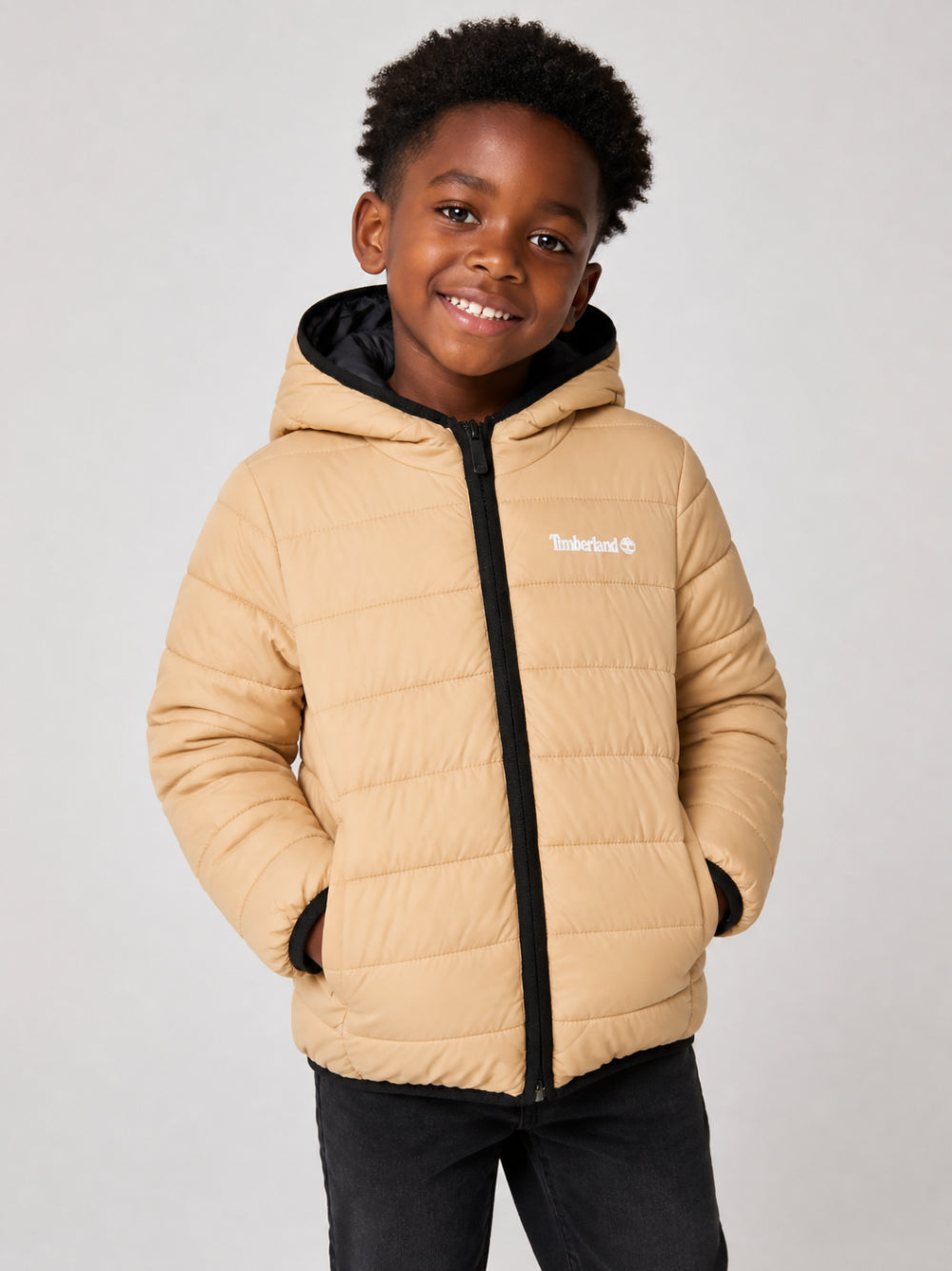 Giubbino per bambino Timberland Kids beige con stampa logo sul petto T60377 230 TIMBERLAND KIDS 
